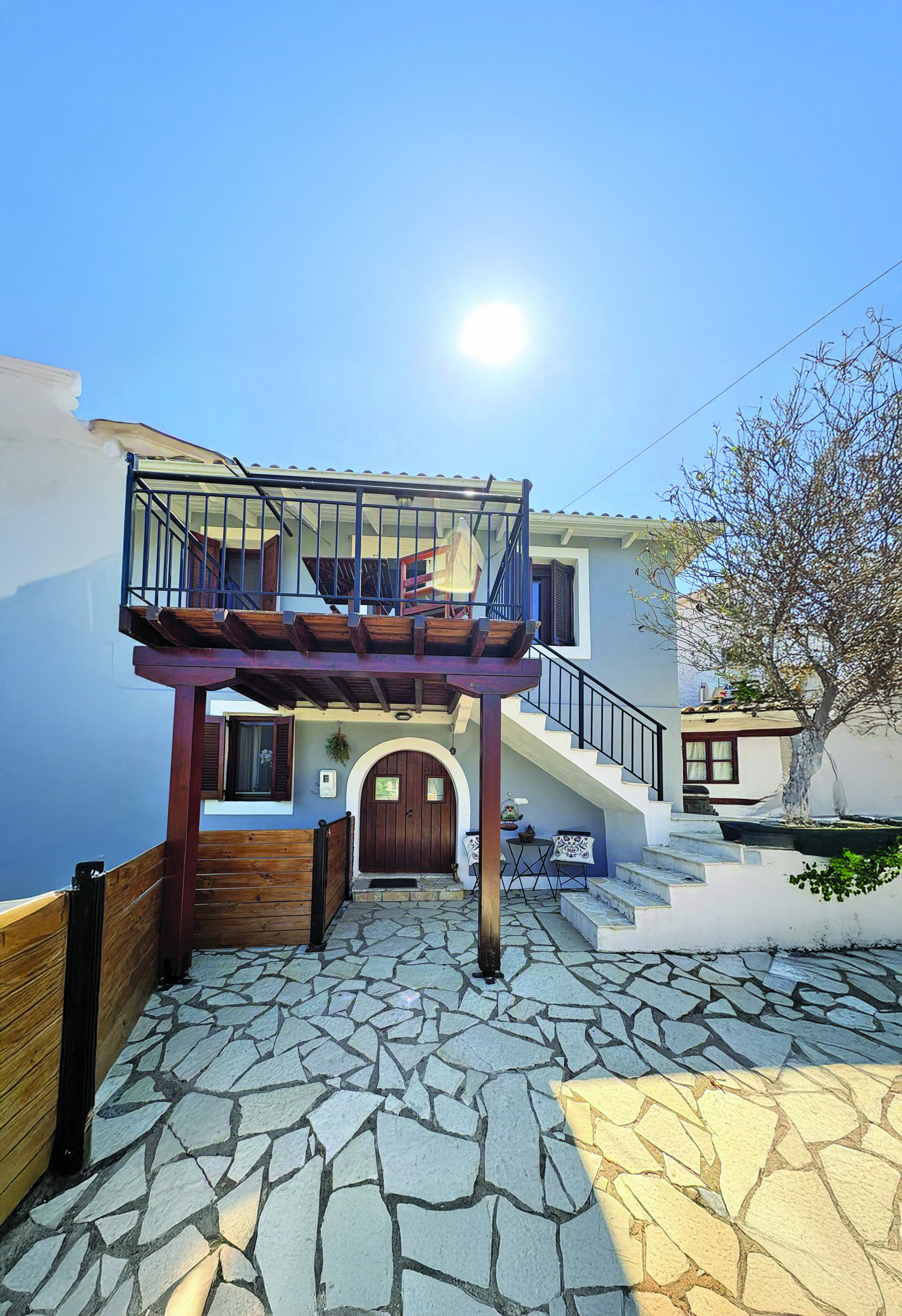 Front exterior of the traditional Greek stone village house for sale in Katouna, Lefkada